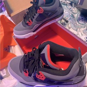 Retro Jordan 4s in hyper orange